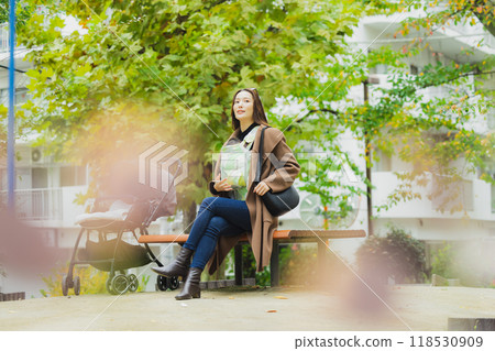 Mother walking with baby 118530909