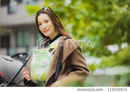 Mother walking with baby Mother walking with baby 118530919
