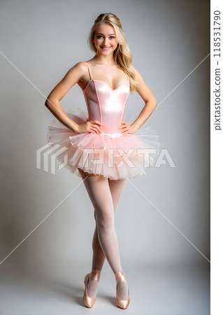 Ballerina posing in a studio in a pink outfit 118531790
