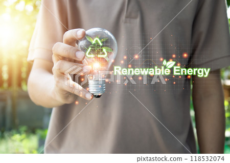 renewable energy concept Light bulb hand and showing sustainable plant rotating arrow icon. 118532074