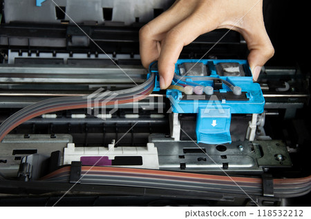 Technician repairing printer, fixing printer head Technician repairing printer, fixing printer head 118532212