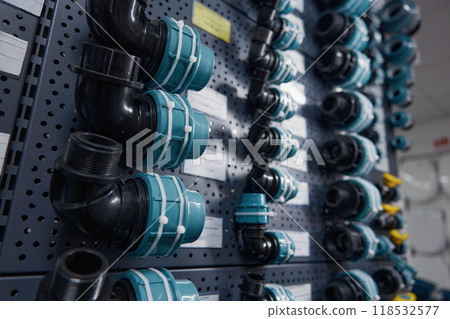 Plastic adapters and pvc fitting supplies assortment for plumbing on display Plastic adapters and pvc fitting supplies assortment for plumbing on display 118532577