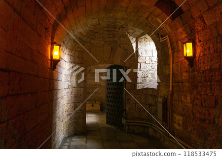underground passage, tunnel in an ancient castle underground passage, tunnel in an ancient castle 118533475
