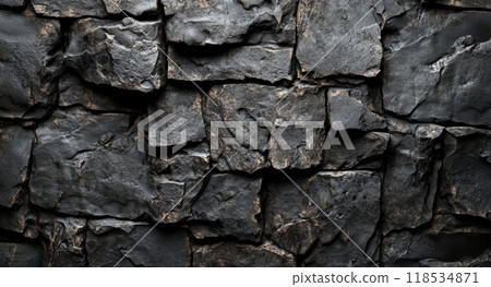 Textured stone wall with uneven slabs arranged in a rustic pattern for interior design ideas 118534871