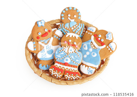 christmas gingerbread cookie in a wicker basket isolated on white background. Top view. Flat lay 118535416
