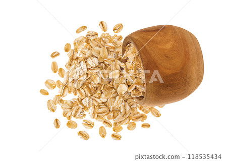 Oat flakes in wooden bowl isolated on white background with full depth of field. Top view. Flat lay 118535434