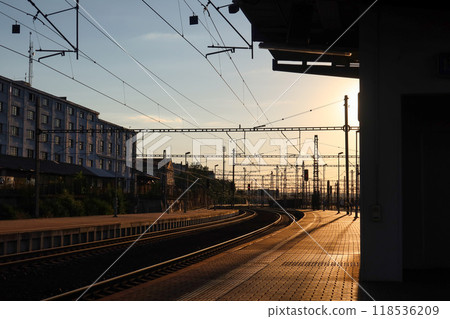Sunset at Prague Liben Railway Station with Tracks and Overhead Lines Sunset at Prague Liben Railway Station with Tracks and Overhead Lines 118536209