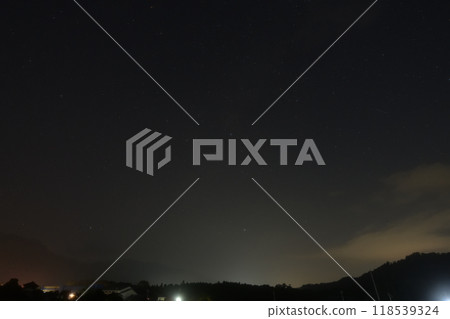 The Great Summer Triangle descending to the mountain edge in the western sky before dawn in Hakushu Town, Hokuto City 118539324