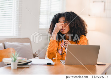 Tired African American Woman at Laptop Rubbing Eyes Tired African American Woman at Laptop Rubbing Eyes 118539704