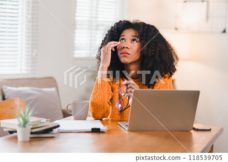 Tired African American Woman at Laptop Rubbing Eyes Tired African American Woman at Laptop Rubbing Eyes 118539705