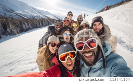 Friends capture snowy mountain joy in a cheerful group selfie amid the wintry alpine landscape. 118541104