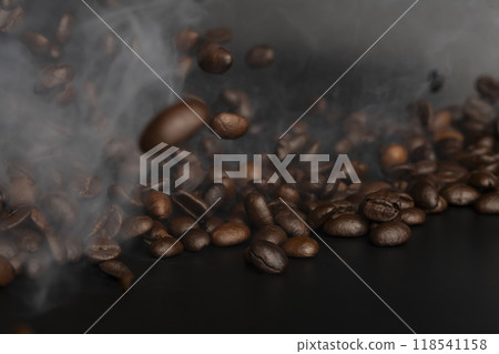 Coffee beans Steam rising from roasted coffee beans Coffee beans Steam rising from roasted coffee beans 118541158