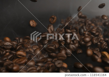 Coffee beans Steam rising from roasted coffee beans Coffee beans Steam rising from roasted coffee beans 118541164