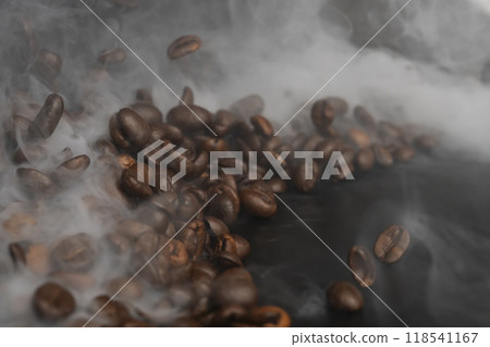 Coffee beans Steam rising from roasted coffee beans Coffee beans Steam rising from roasted coffee beans 118541167