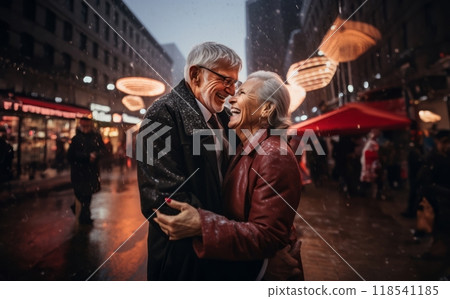 In the serene snowfall, an elderly couple shares a heartfelt embrace, enveloped in the warm glow of love on a wintry night In the serene snowfall, an elderly couple shares a heartfelt embrace, enveloped in the warm glow of love on a wintry night 118541185
