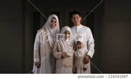 Portrait of an Asian Muslim family in traditional Ihram attire, reflecting cultural heritage and religious devotion.Generated image 118541997