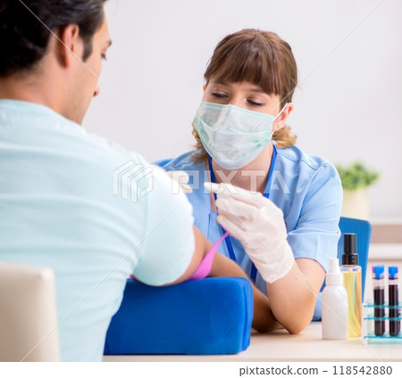 Young patient during blood test sampling procedure Young patient during blood test sampling procedure 118542880