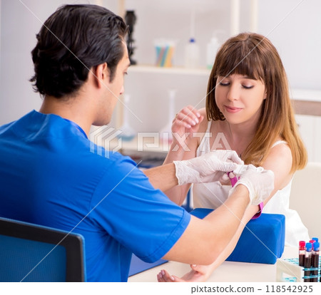 Young patient during blood test sampling procedure 118542925