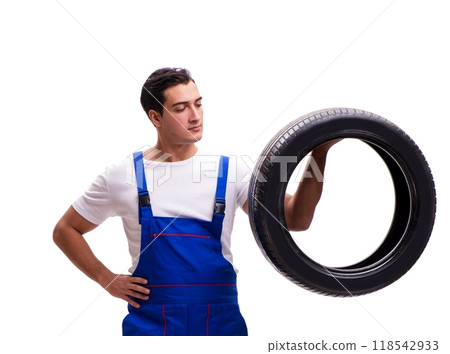 Handsome tyre repairman isolated on white 118542933