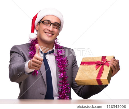 Young businessman celebrating christmas in office Young businessman celebrating christmas in office 118543008