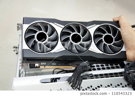 Side view of computer graphics card, computer equipment parts, computer assembler 118543323