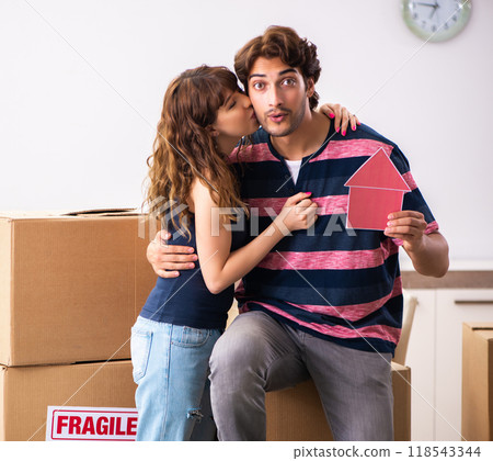 Young family moving to new house apartment 118543344