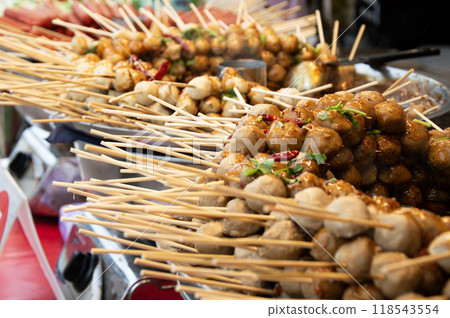 Grilled meatballs with dipping sauce, Thai street food that is famous all over the world. 118543554