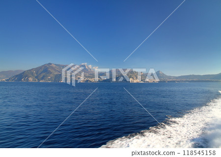 Sorrento, Naples, Campania, Republic of Italy, Southern Europe: Cliffside townscape seen from the ferry 118545158