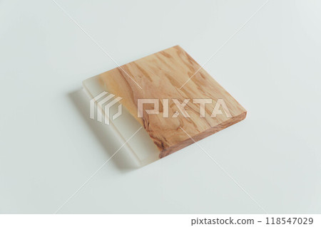Coasters made from clear material and olive wood Coasters made from clear material and olive wood 118547029