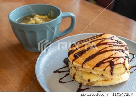 Hot cake with chocolate sauce Hot cake with chocolate sauce 118547297