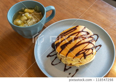 Hot cake with chocolate sauce 118547298