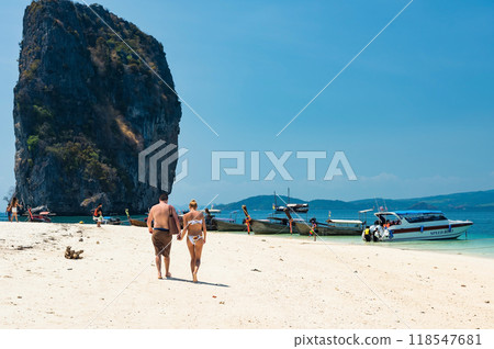 Foreign tourist couple together at Poda island, Krabi, Thailand Foreign tourist couple together at Poda island, Krabi, Thailand 118547681