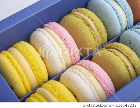 Exclusive macaroons in blue box collection with flavor Exclusive macaroons in blue box collection with flavor 118548232