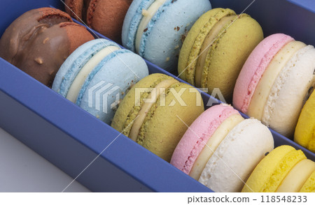 Exclusive macaroons in blue box collection with flavor 118548233