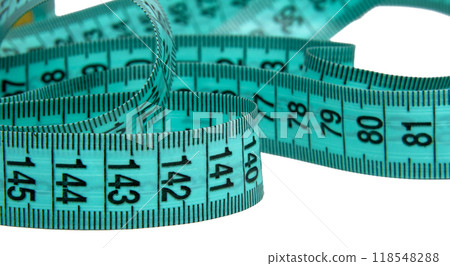 Blue rubber tape measure for sewing cloth or fabric isolated on the white Blue rubber tape measure for sewing cloth or fabric isolated on the white 118548288