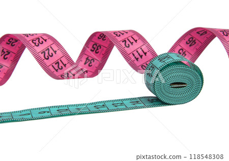 Pink and blue rubber tapes measure for sewing cloth or fabric isolated on the white Pink and blue rubber tapes measure for sewing cloth or fabric isolated on the white 118548308