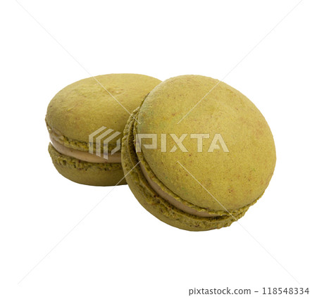 Exclusive green macaroon with flavor isolated on the white Exclusive green macaroon with flavor isolated on the white 118548334