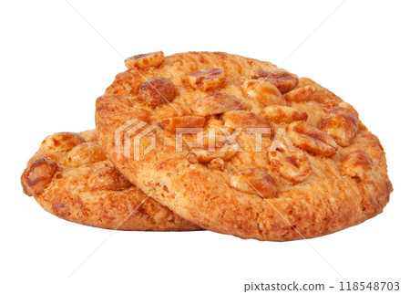 Tasty cookies with peanuts and honey baked isolated on the white Tasty cookies with peanuts and honey baked isolated on the white 118548703