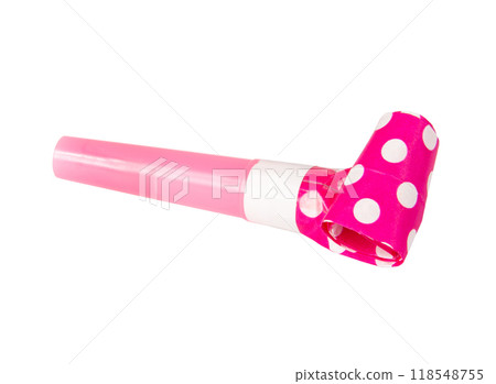 Rolled festive noisemaker or party whistle horn on the white 118548755