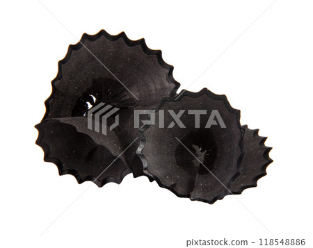 Pencil spiral black sawdust macro isolated on the white Pencil spiral black sawdust macro isolated on the white 118548886