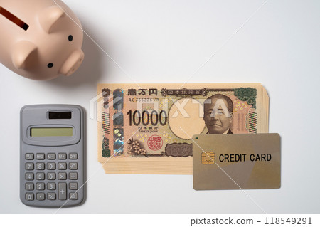 Credit card, 10,000 yen bill, calculator and piggy bank Credit card, 10,000 yen bill, calculator and piggy bank 118549291