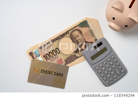 Credit card, 10,000 yen bill, calculator and piggy bank Credit card, 10,000 yen bill, calculator and piggy bank 118549294