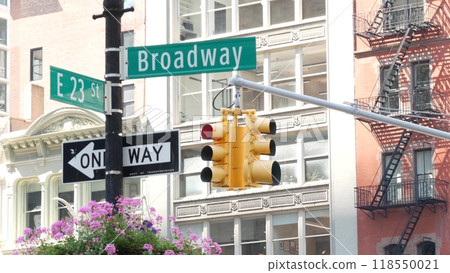 Broadway street road sign, Manhattan midtown architecture, New York City. Traffic signage of 23 st. 118550021