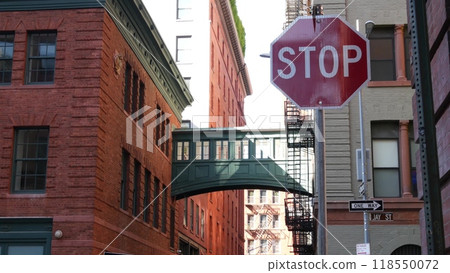 New York City Staple street skybridge. Industrial architecture, red brick building. Manhattan, USA. New York City Staple street skybridge. Industrial architecture, red brick building. Manhattan, USA. 118550072