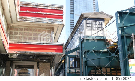 New York elevated subway, metropolitan bridge, metro track above street. Railway transport over road New York elevated subway, metropolitan bridge, metro track above street. Railway transport over road 118550074