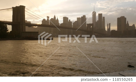 Brooklyn Bridge, Dumbo, rainy foggy day. New York City Manhattan downtown skyline. World Trade Center Brooklyn Bridge, Dumbo, rainy foggy day. New York City Manhattan downtown skyline. World Trade Center 118550265