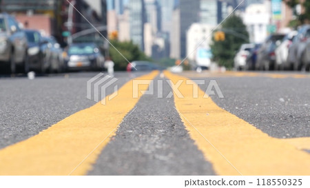 New York City skyline, Manhattan cityscape. Dividing line in Queens, Long Island street road, USA. New York City skyline, Manhattan cityscape. Dividing line in Queens, Long Island street road, USA. 118550325