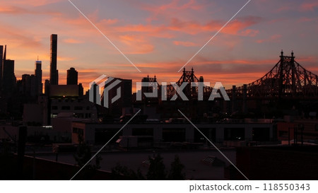 New York City Manhattan skyline cityscape. Rooftop in Queens, Midtown, Queensboro Bridge. Sunset sky 118550343