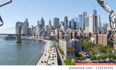 Brooklyn Bridge from Manhattan Bridge. New York City downtown skyline, financial district cityscape. Brooklyn Bridge from Manhattan Bridge. New York City downtown skyline, financial district cityscape. 118550385