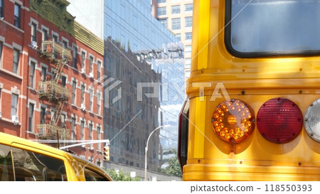 Yellow School Bus on New York Manhattan street, schoolbus truck on USA city road. Children education Yellow School Bus on New York Manhattan street, schoolbus truck on USA city road. Children education 118550393